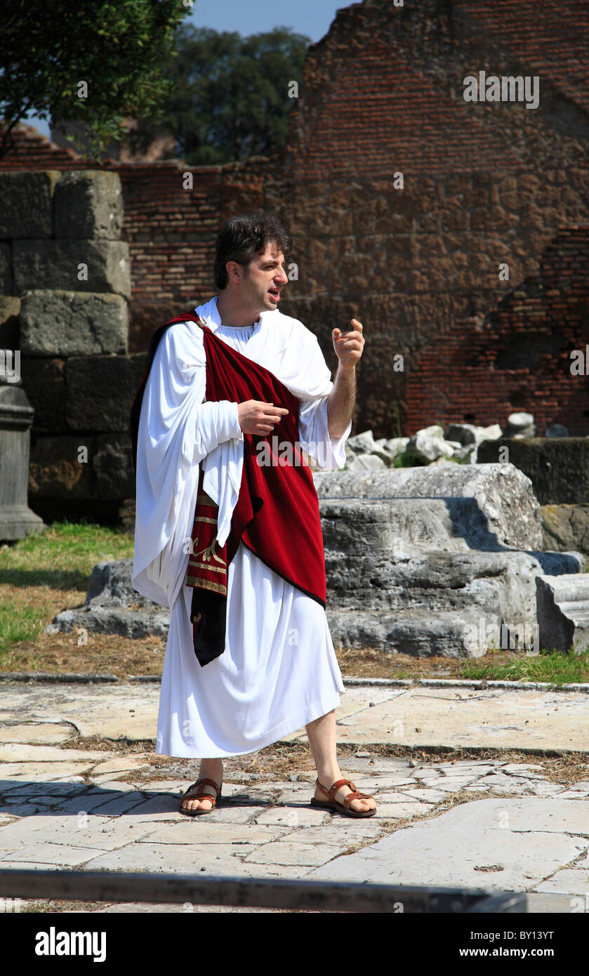 Actor in role of Roman senator acts part in the Roman Forum, Rome Stock Photo