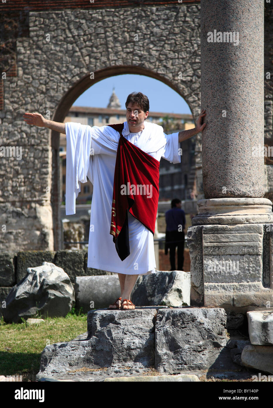 Actor in role of Roman senator acts part in the Roman Forum, Rome Stock Photo