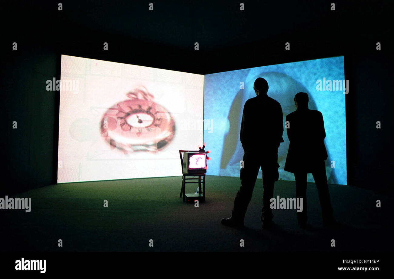 People looking at An Art Exhibition, National Museum and Galleries, Cardiff Stock Photo Alamy