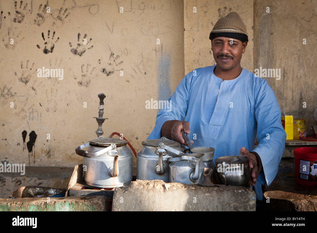 Stall holder making tea and coffee at the weekly Camel Market near Luxor, Egypt Stock Photo