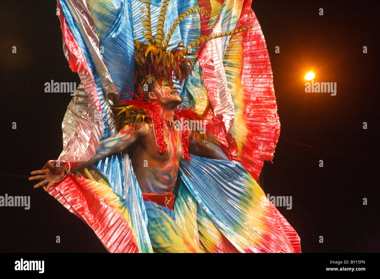 Individual competition,Rainbow -winged dancing masquerader with feathered headdress Stock Photo