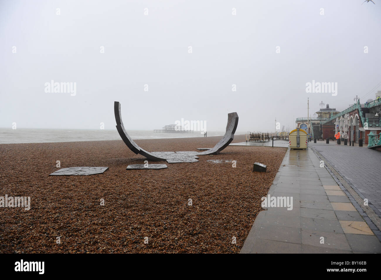 Sculpture on Brighton seafront with West Pier remains in background