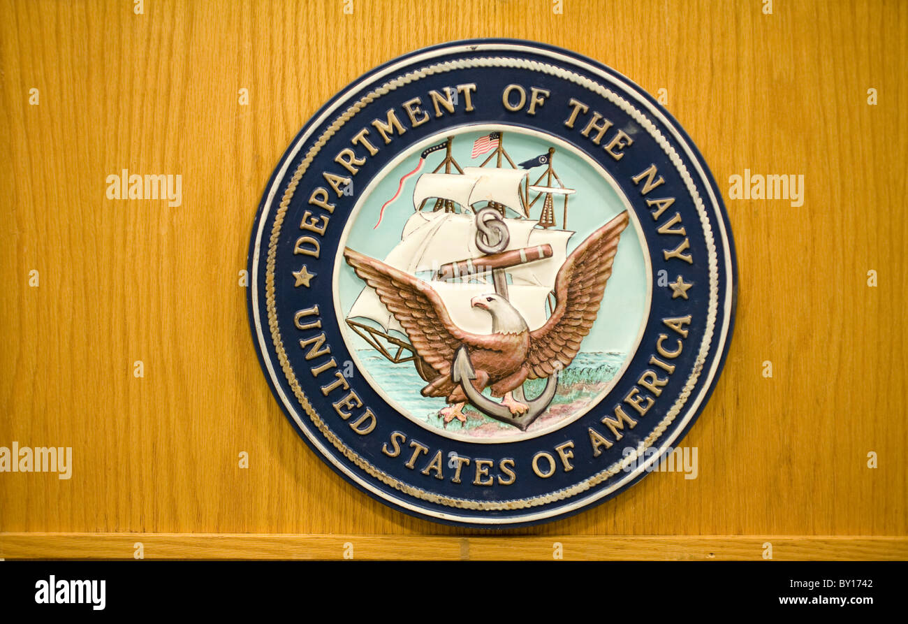 United States Navy emblem in hung on a podium. Stock Photo