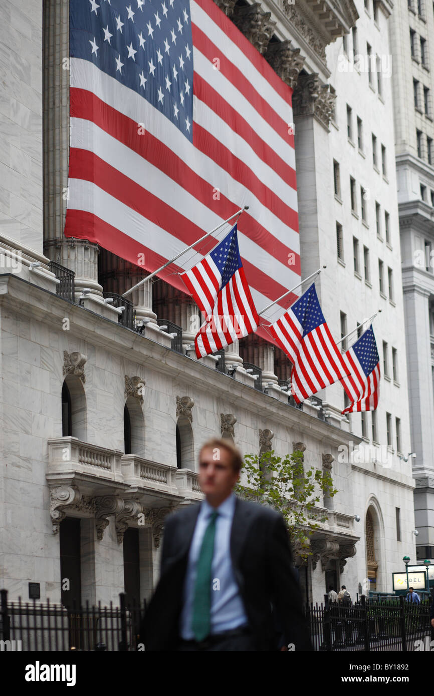 Man in a suit in front of NYSE, New York City, United States of America Stock Photo