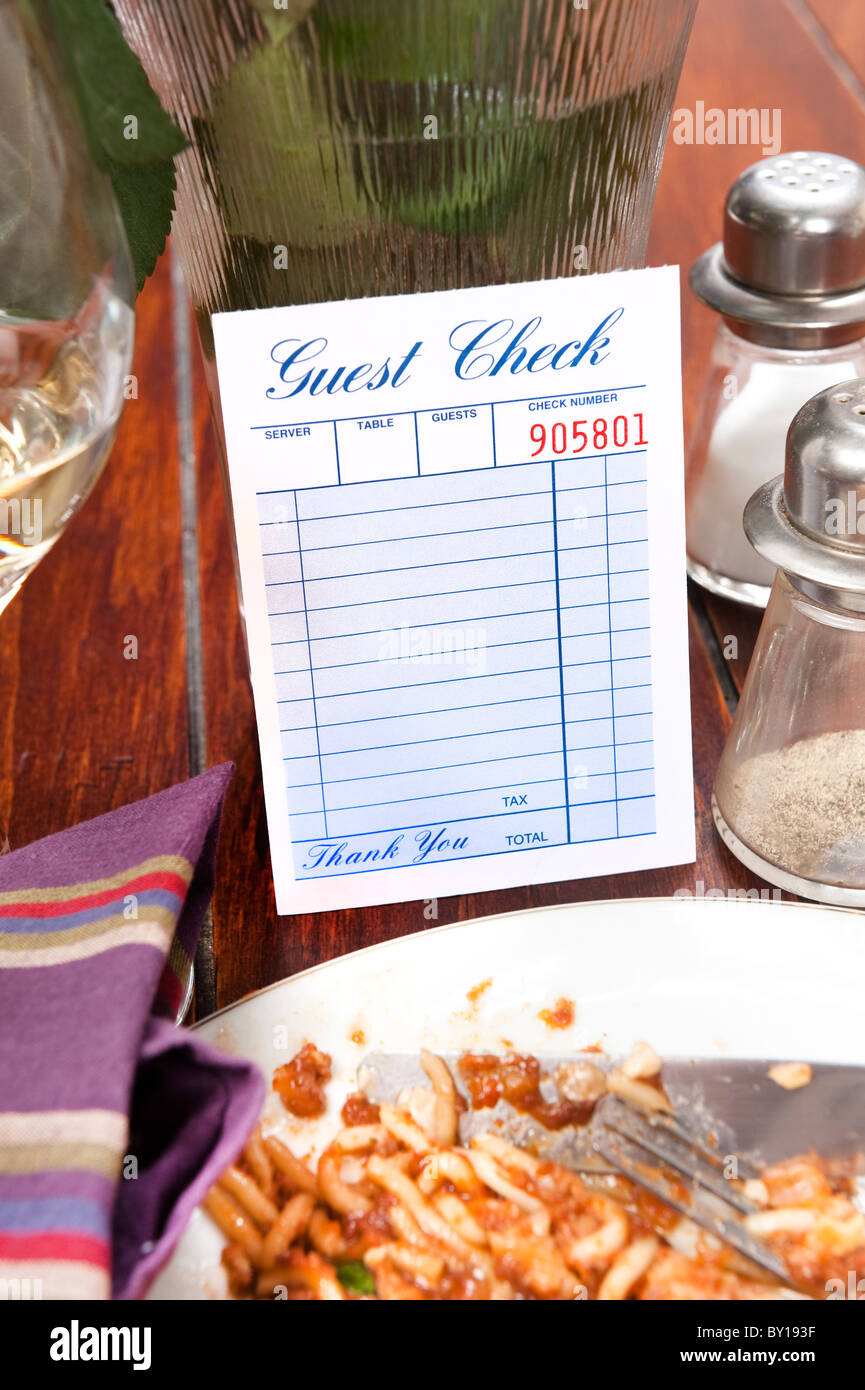 A restaurant dinnertime guest check left blank for placement of copy Stock Photo
