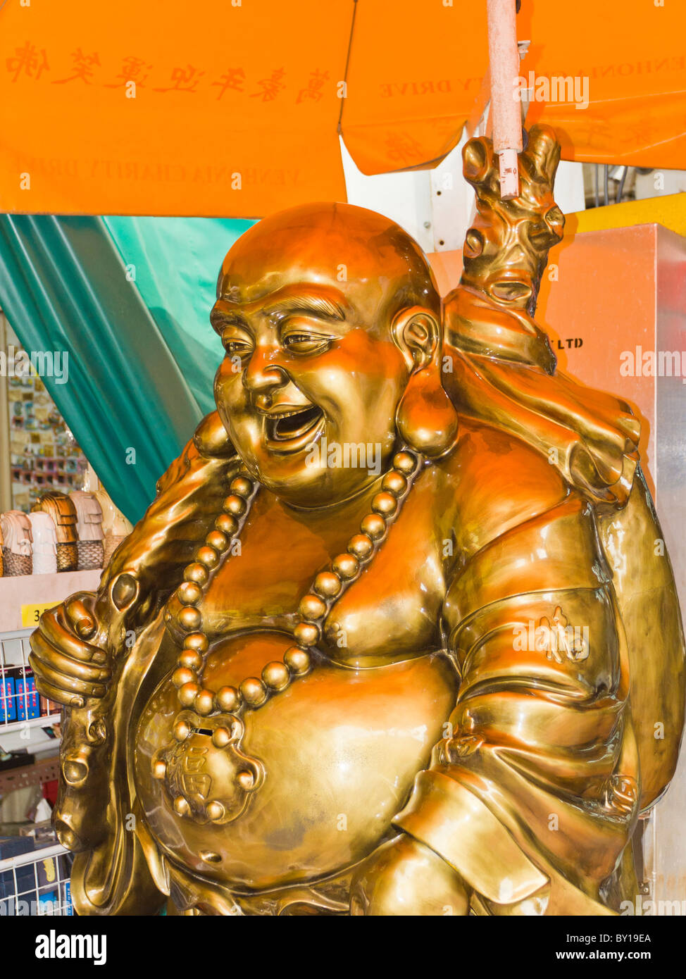 Golden buddha statue in Singapore's Chinatown District Stock Photo Alamy