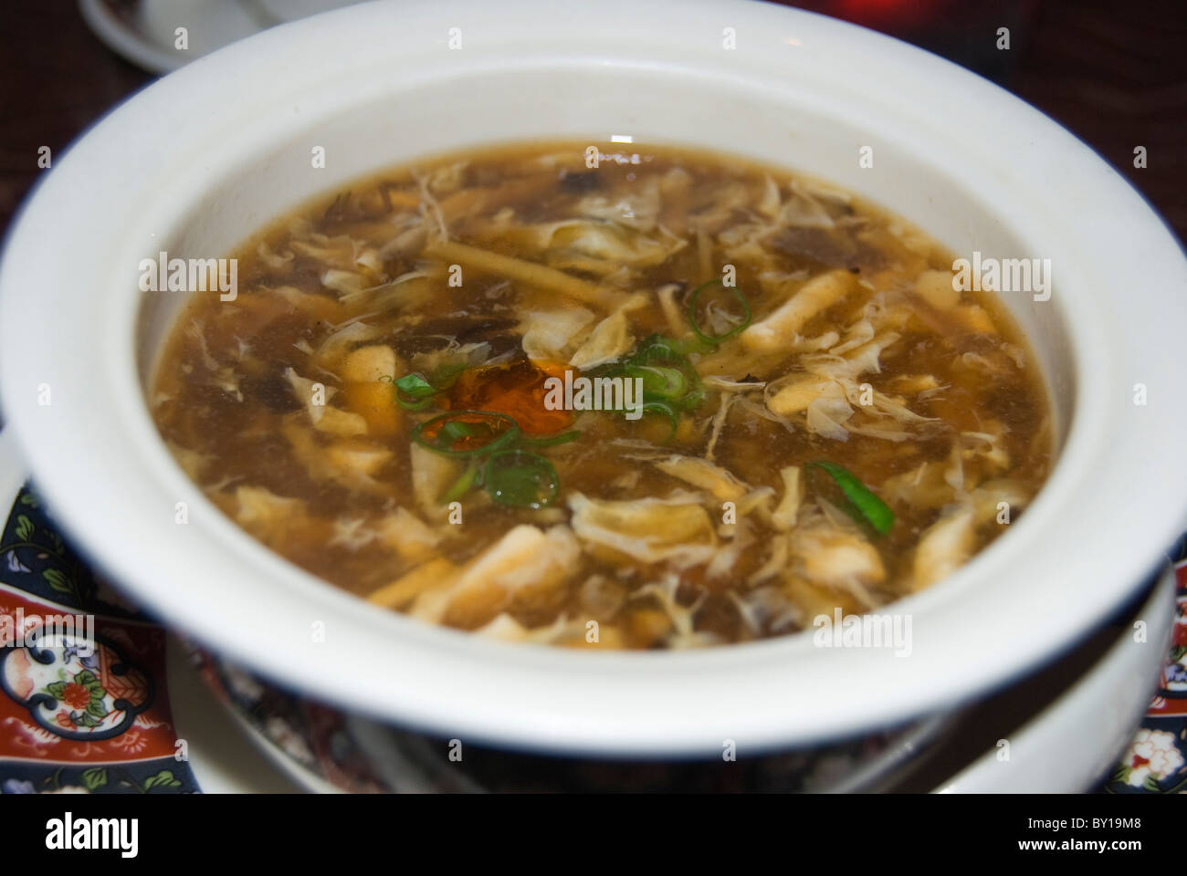 Hot and sour Sichuan soup in an authentic restaurant in Hong Kong Stock Photo