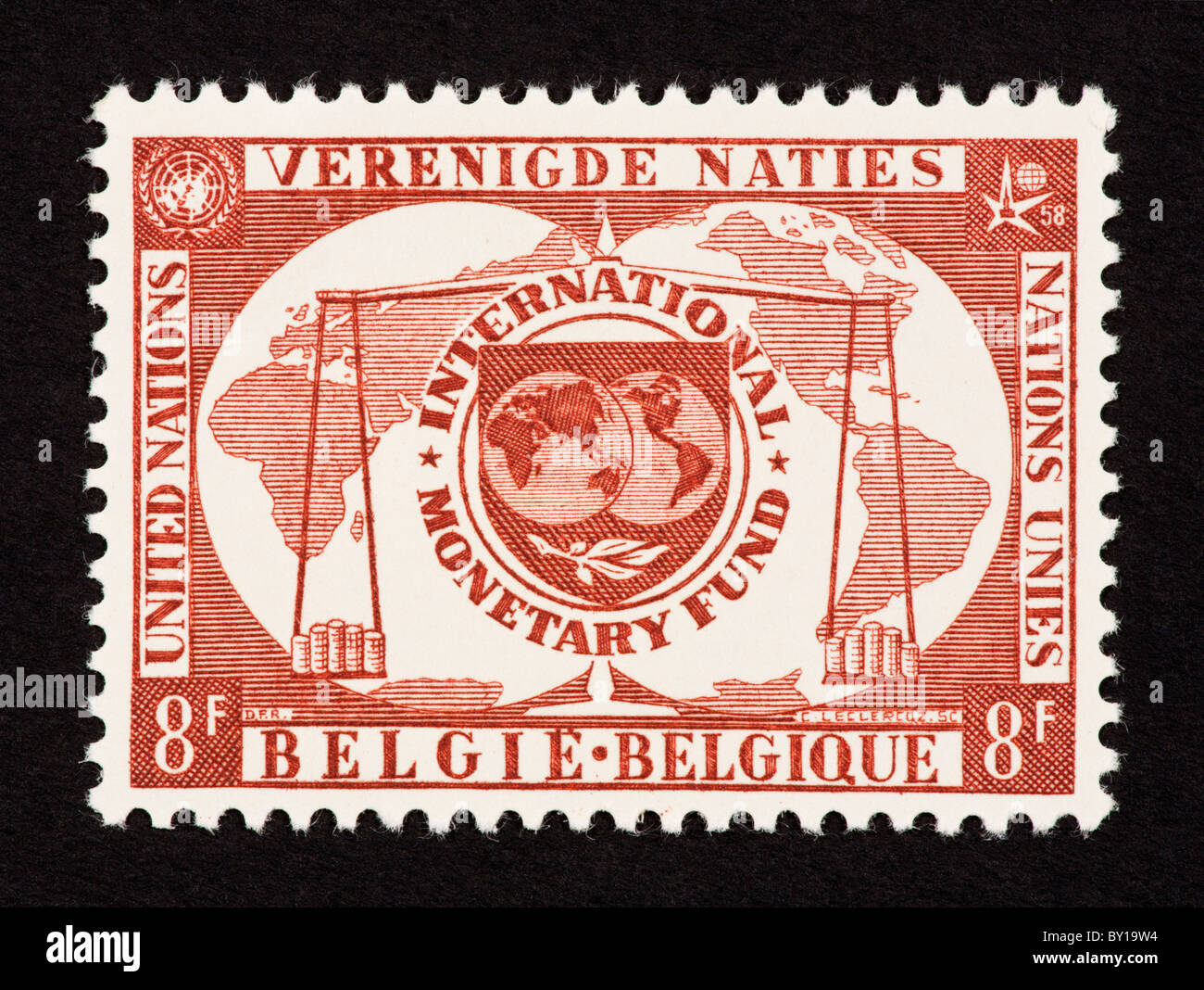 Postage stamp from Belgium depicting money, to honor the United Nations and the International Monetary Fund. Stock Photo