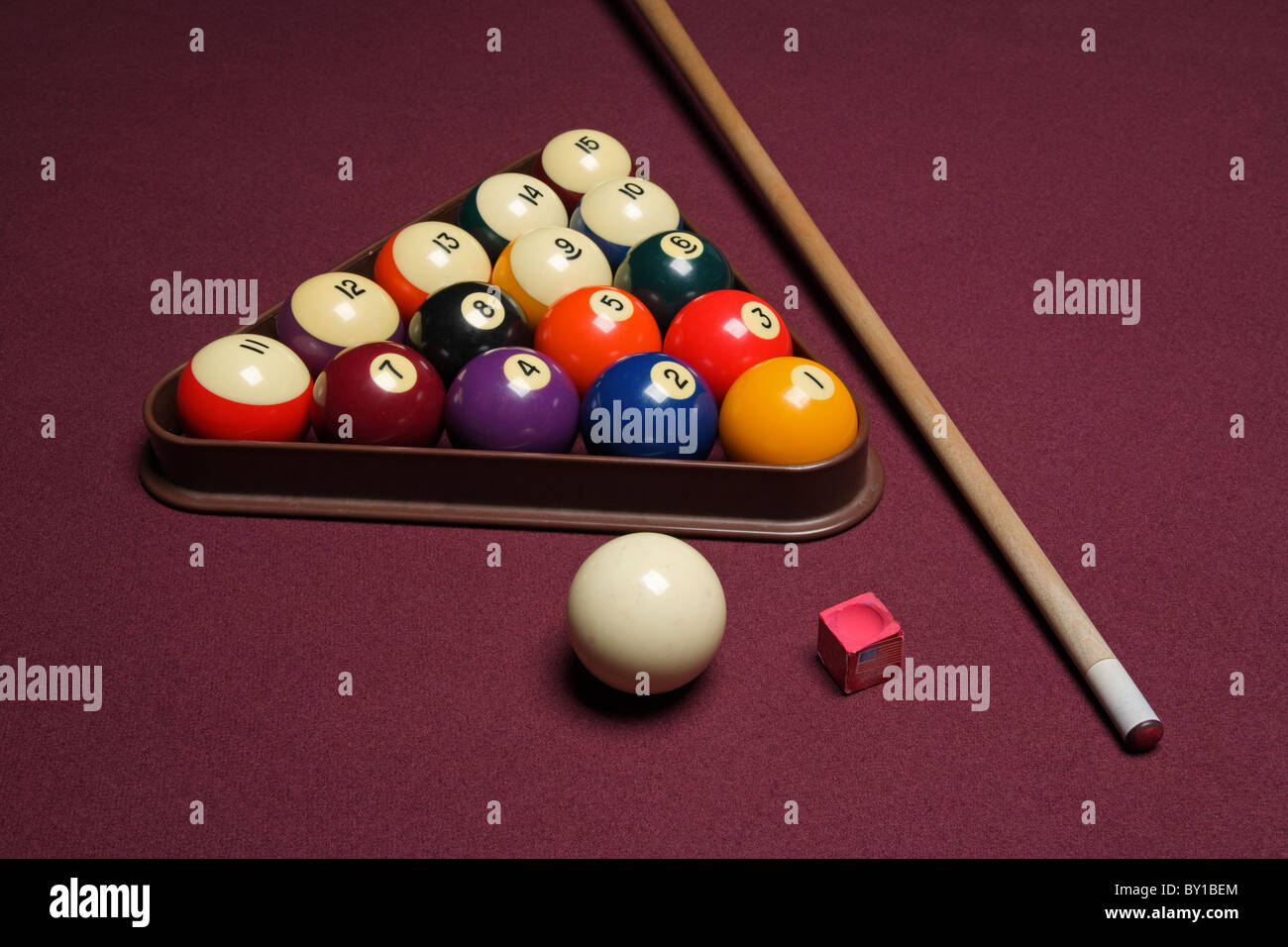 billiard pool table with cue stick triangle and balls Stock Photo Alamy