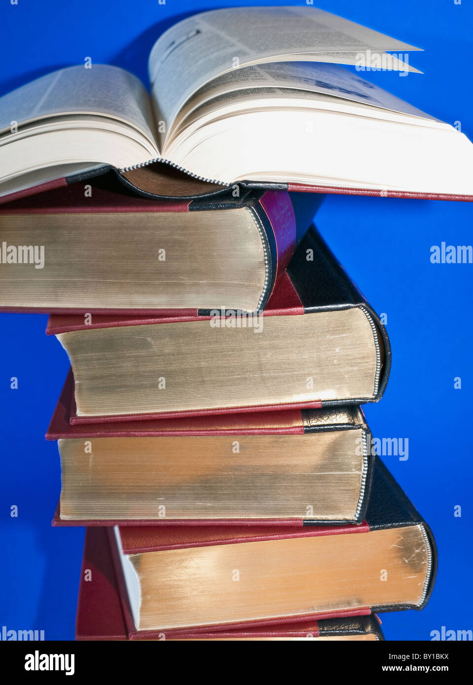 Books piled on top of each other Stock Photo