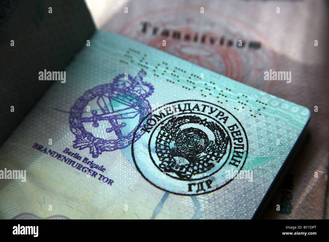 Fake border stamps in a passport; Checkpoint Charlie, Berlin at the old crossing between the Allied and Russian sectors Stock Photo