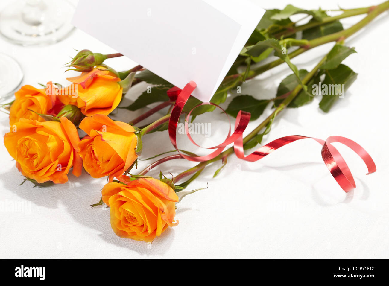 Roses and glasses of champagne Stock Photo