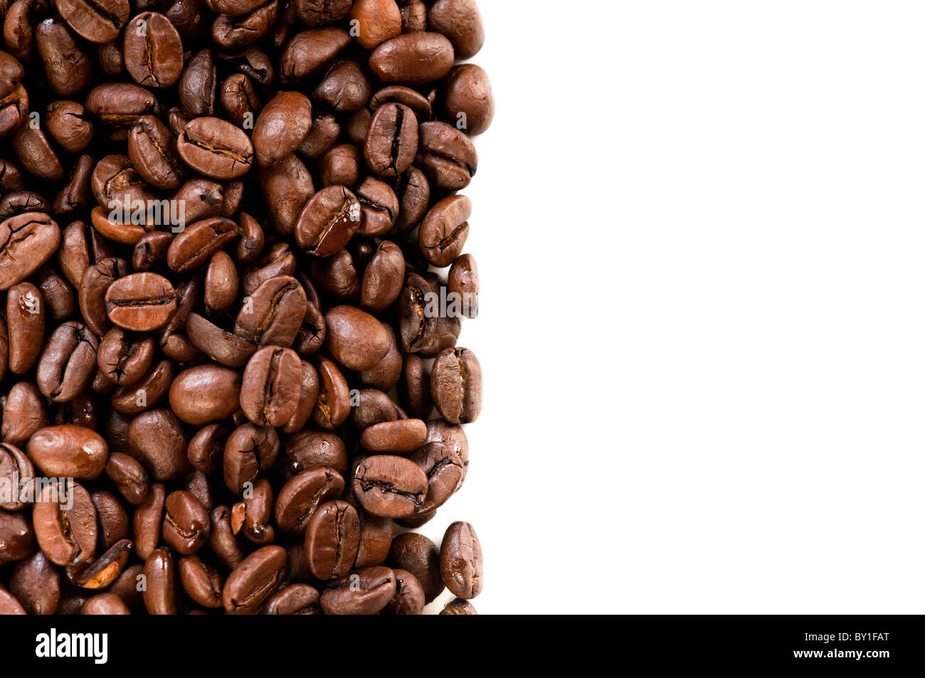 Coffee beans on the white background with copy space Stock Photo - Alamy