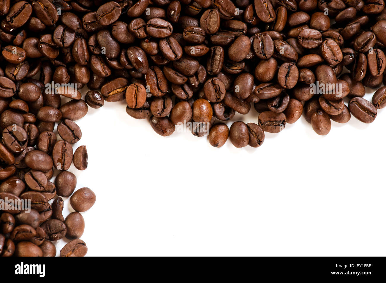 Coffee beans on the white background with copy space Stock Photo - Alamy
