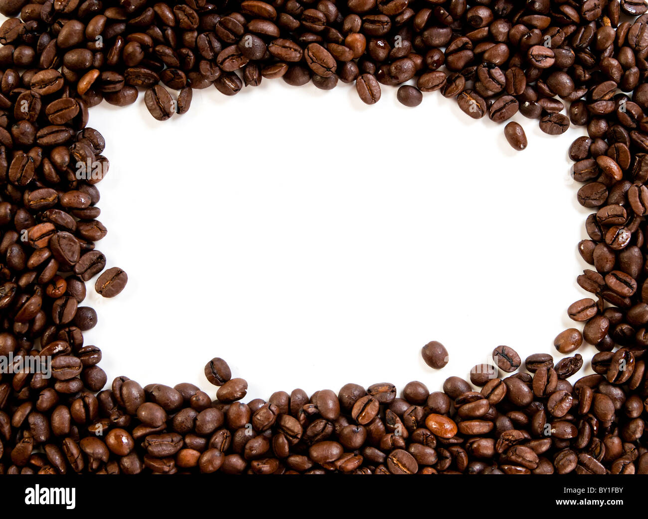 Coffee beans on the white background with copy space Stock Photo - Alamy