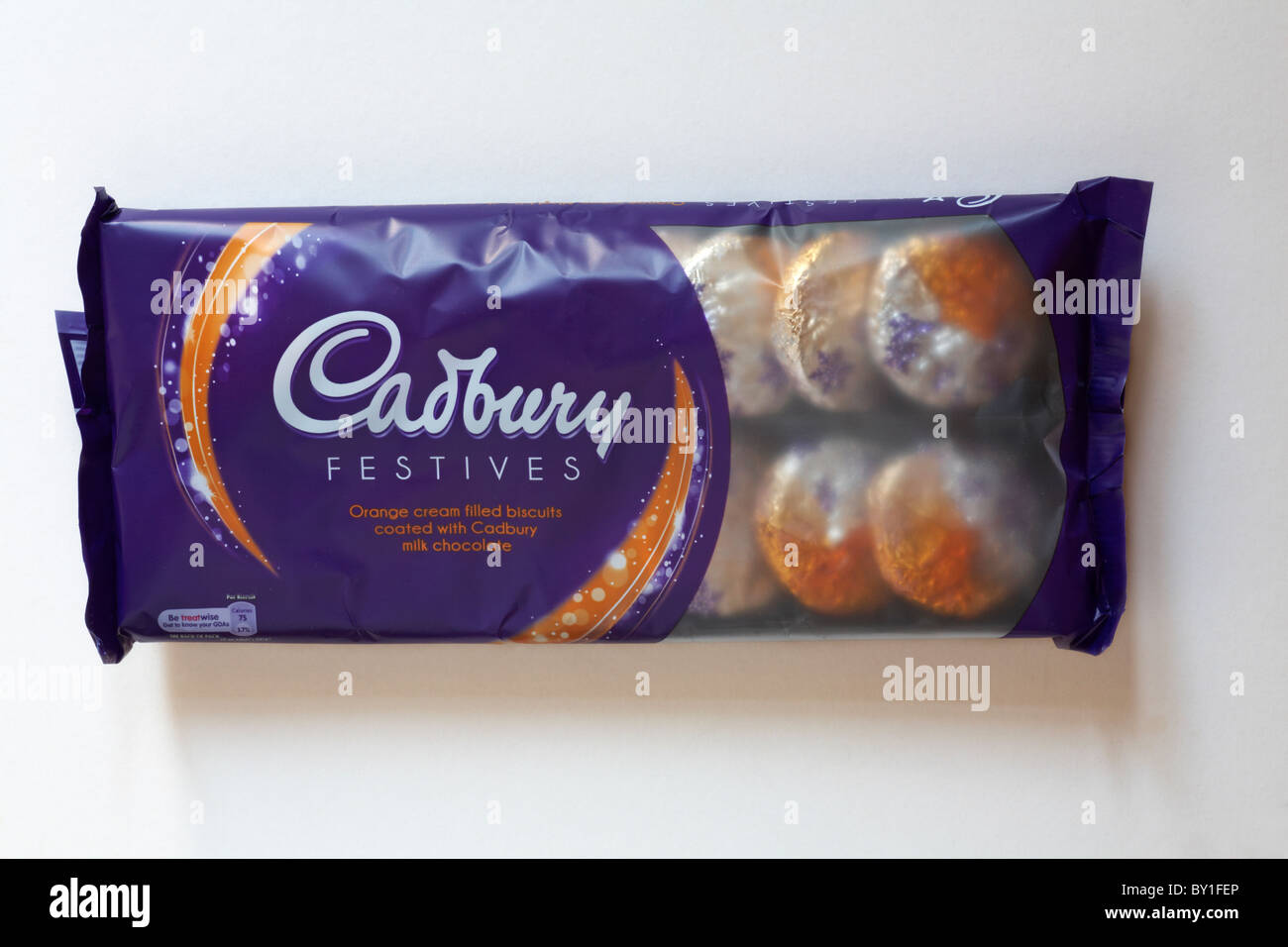 Packet of Cadbury Festives orange flavour biscuits isolated on white background Stock Photo
