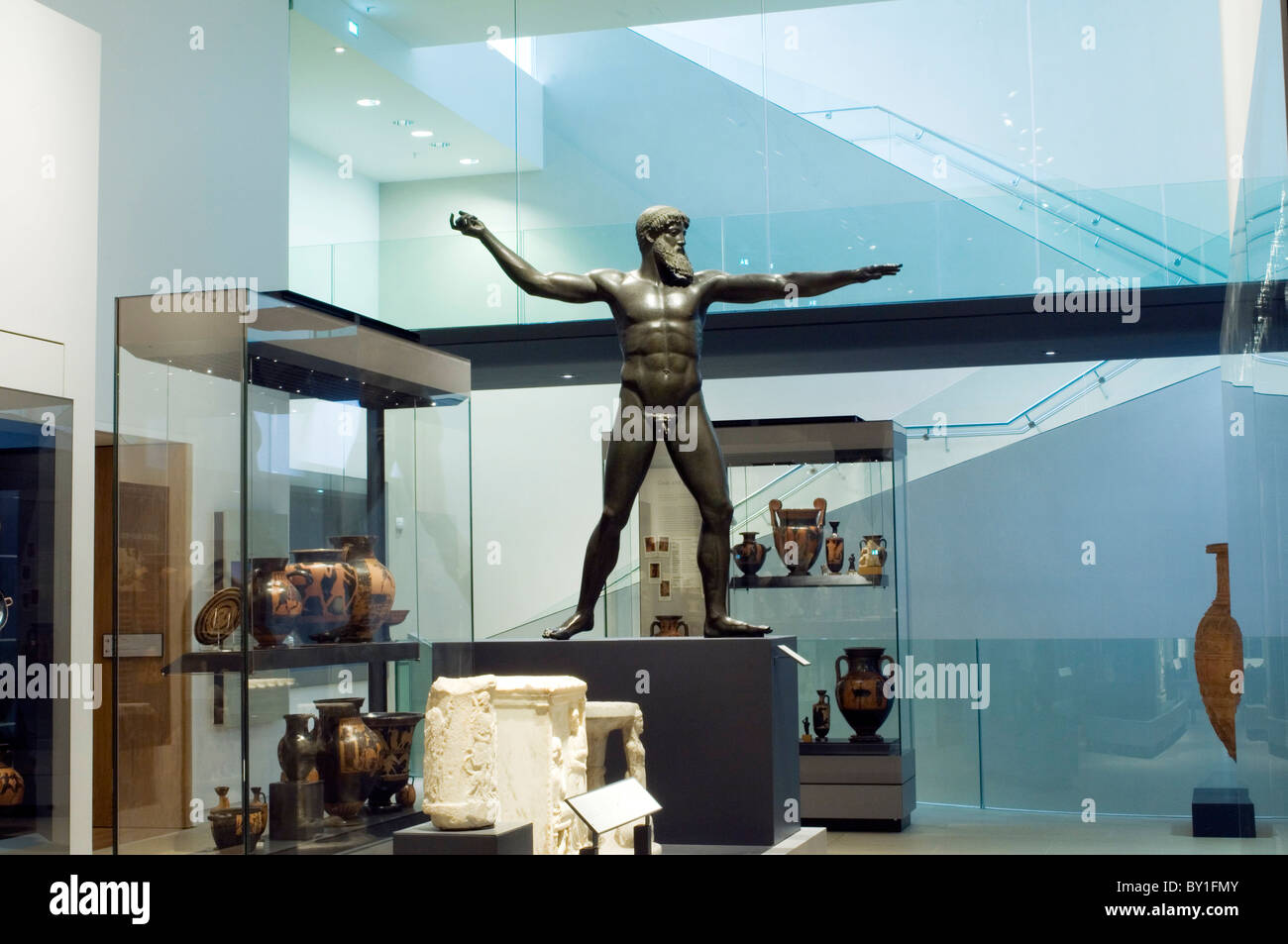 Exhibits from Near East. Large standing statue is a Bronze cast of a