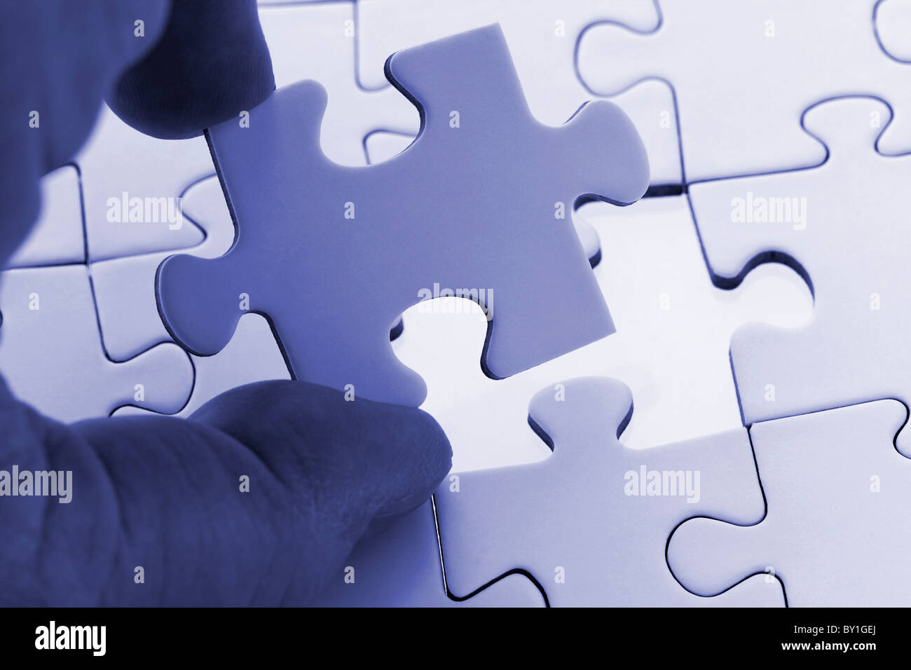 digital enhancement - parts of jigsaw puzzle - symbolism for existential orientation resp. education Stock Photo