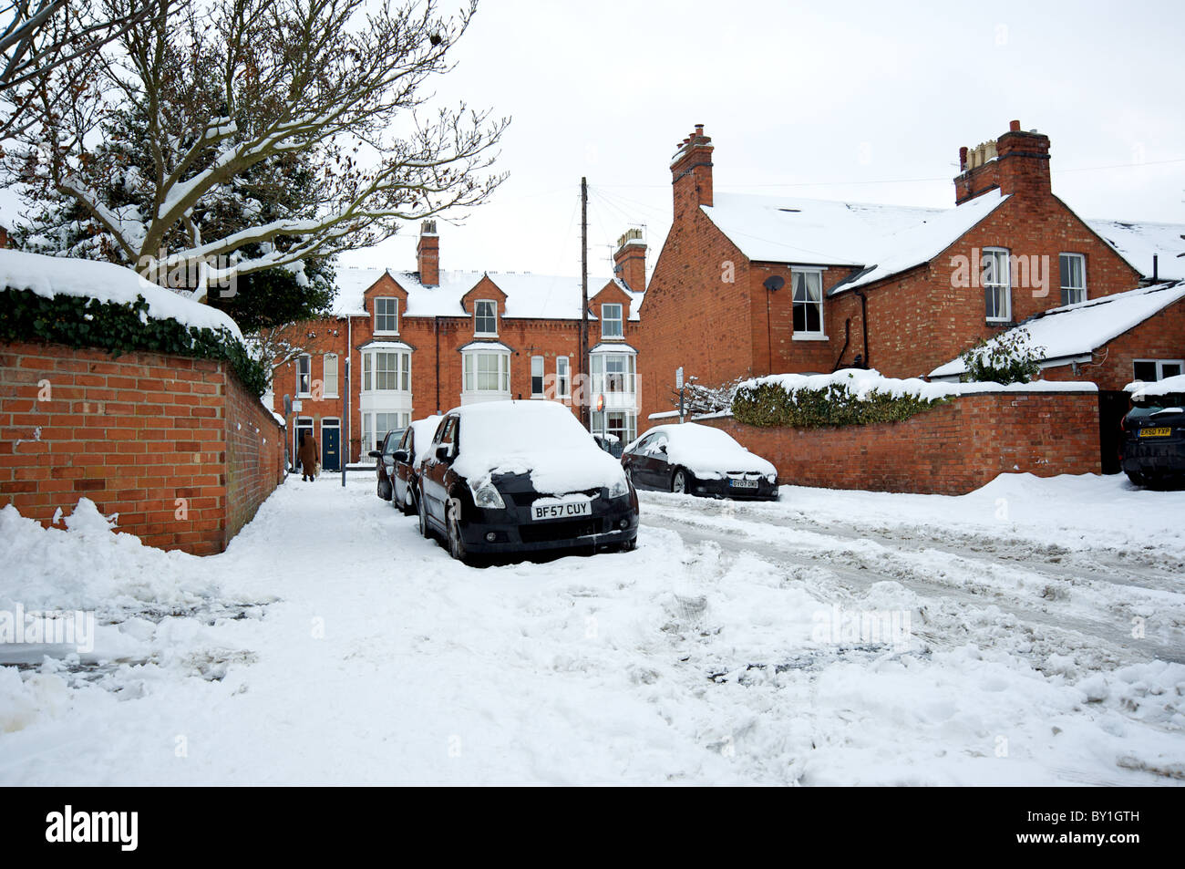 Residential houses and cars parked in the snow, Wellesbourne Grove