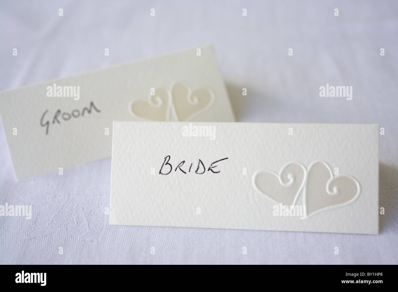 bride and groom place cards Stock Photo - Alamy