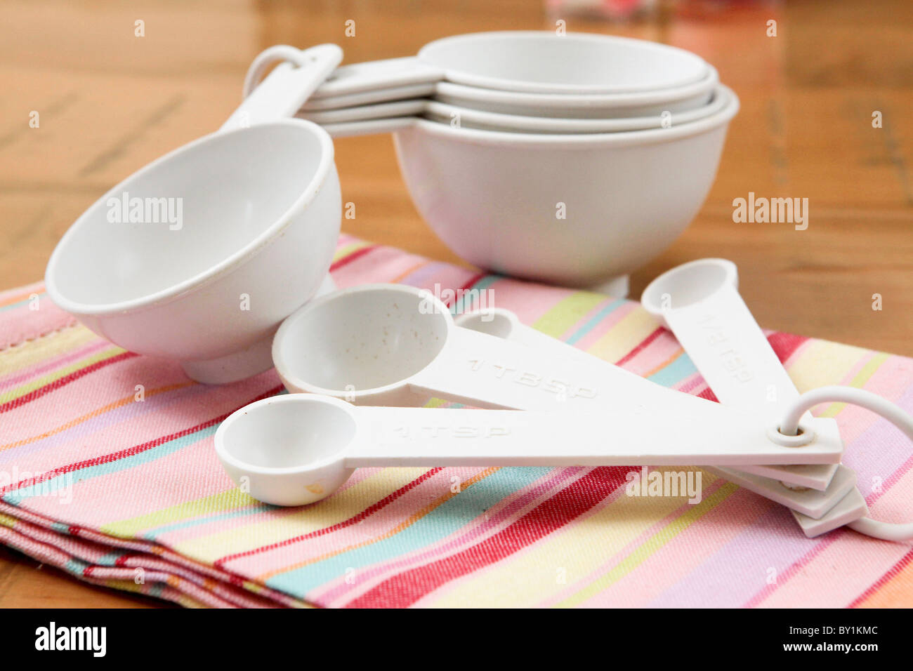 Baking utensils measuring spoons of different sizes and volume Stock