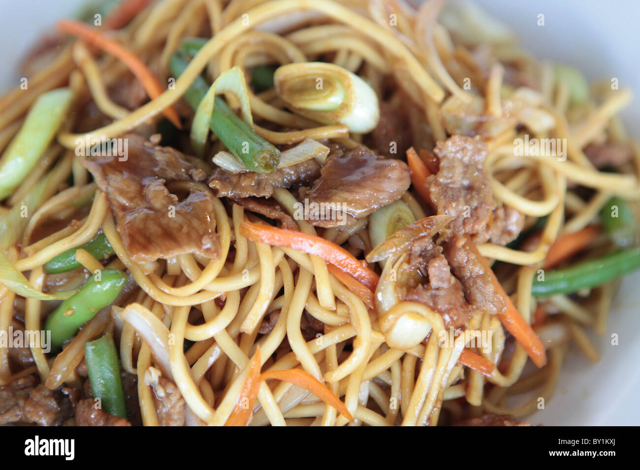 Stir fried beef noodles Stock Photo - Alamy
