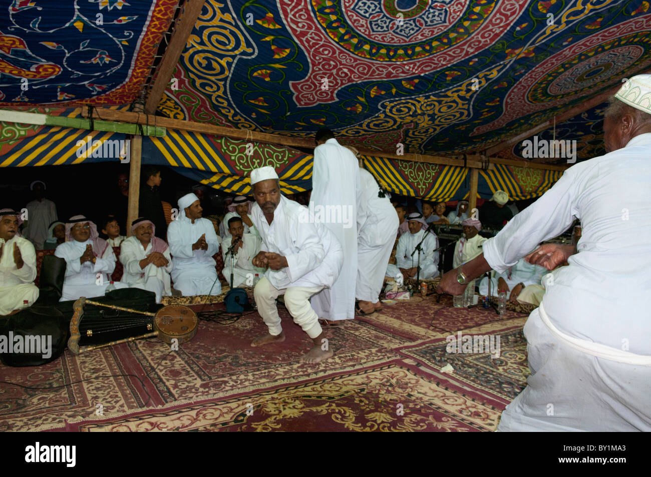 Guests celebrate with dance during a traditional Bedouin wedding celebration. El Tur, Sinai Peninsula, Egypt Stock Photo