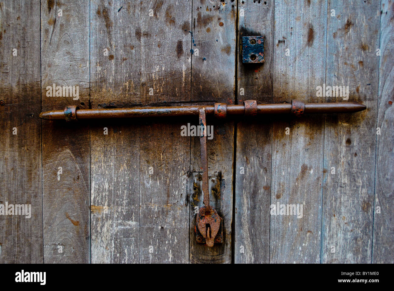 Old rusty lock on the wooden door in Fort San Cristobal Stock Photo - Alamy