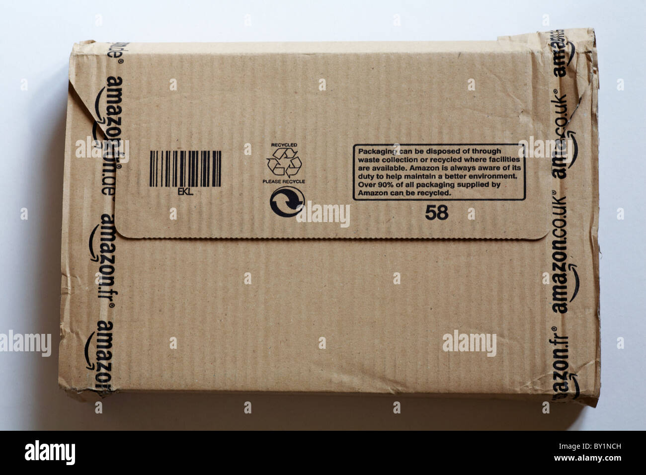 Close up of parcel from Amazon isolated on white background Stock Photo