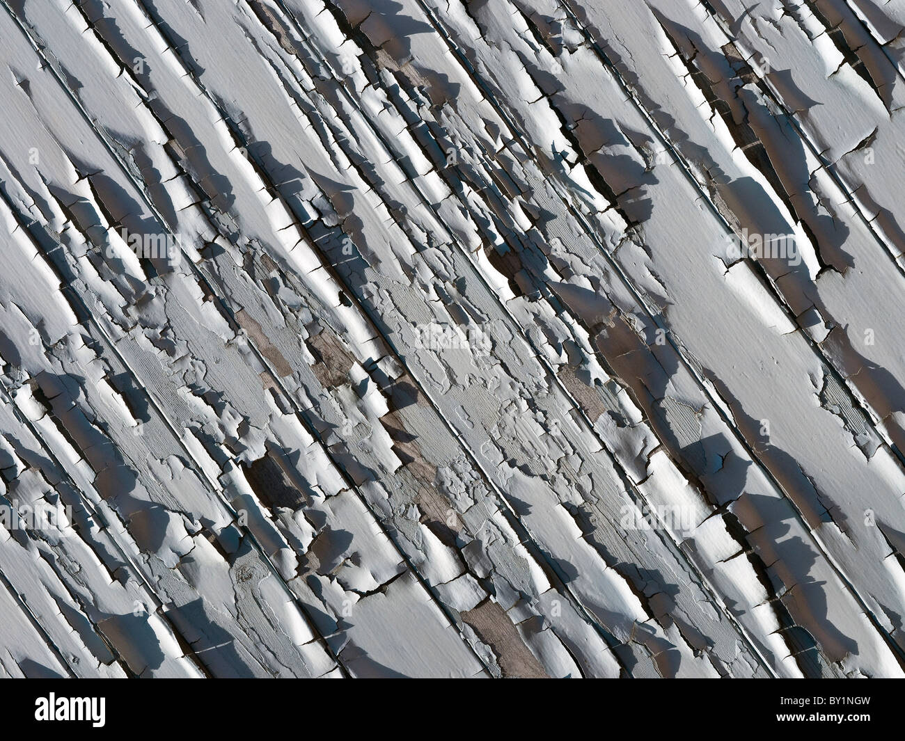 Old garage door showing badly flaking paint France Stock Photo Alamy
