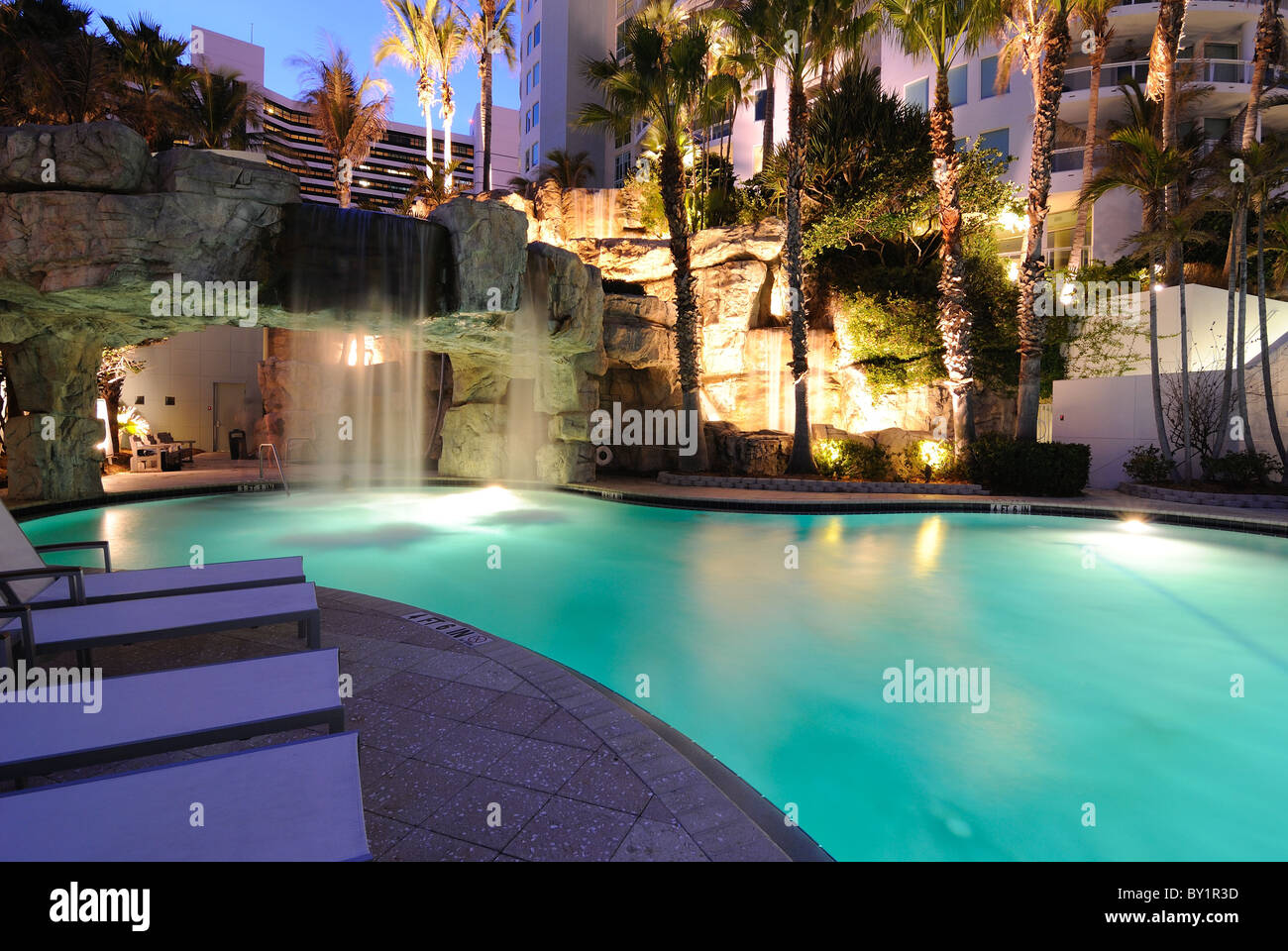 A resort swimming pool at twilight Stock Photo