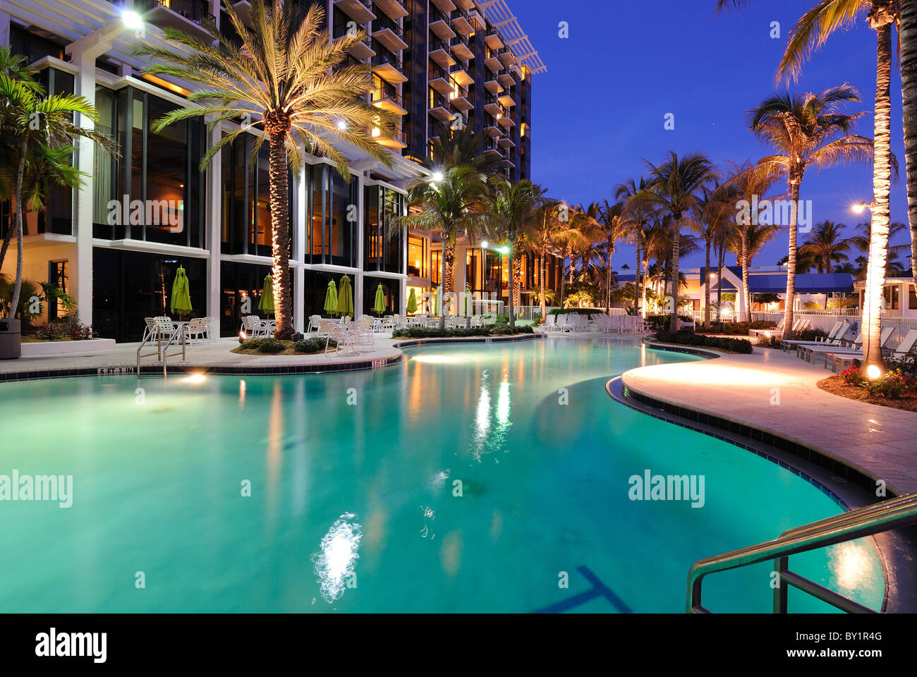 A resort swimming pool at twilight Stock Photo