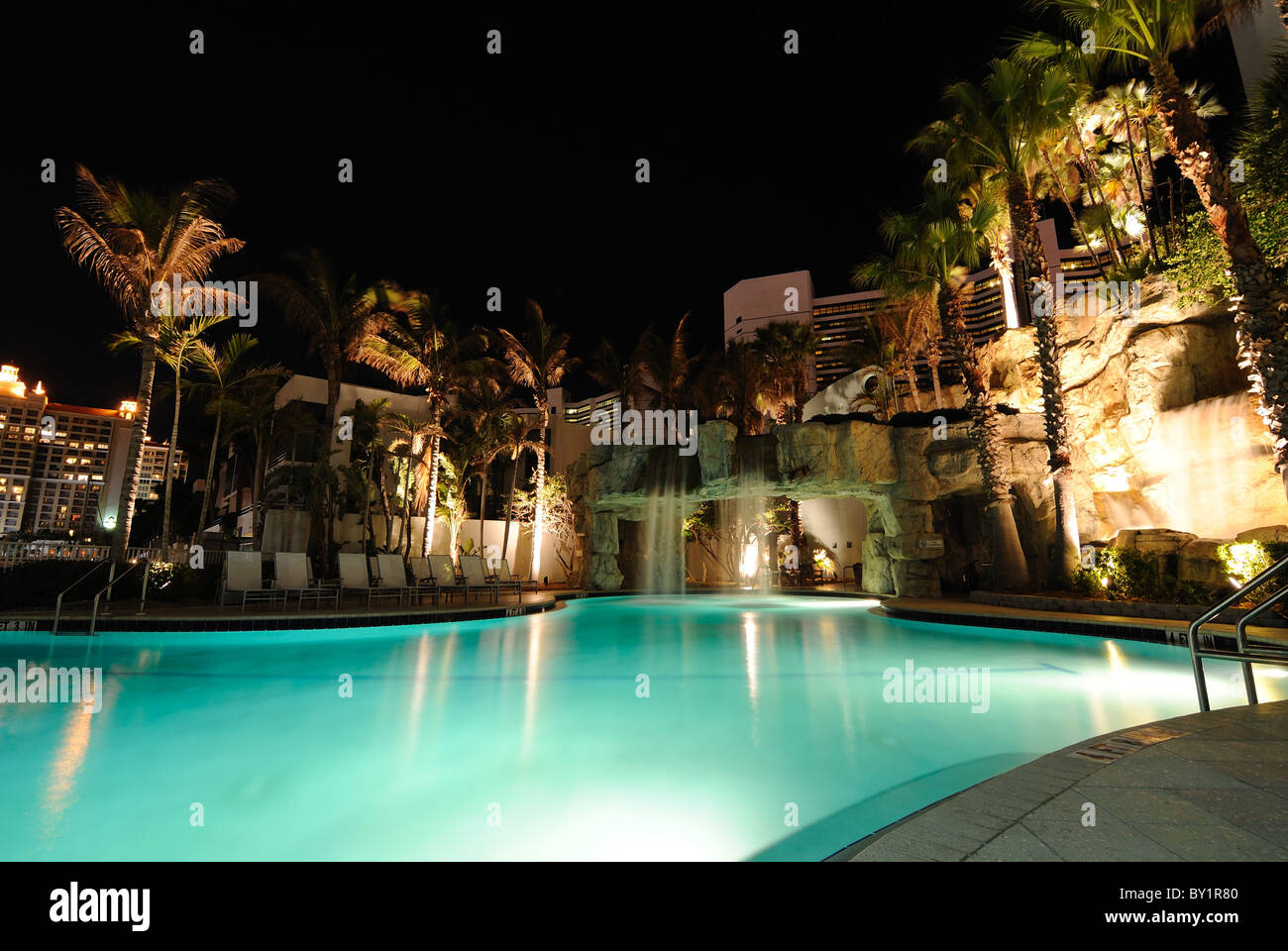 A resort swimming pool at night Stock Photo