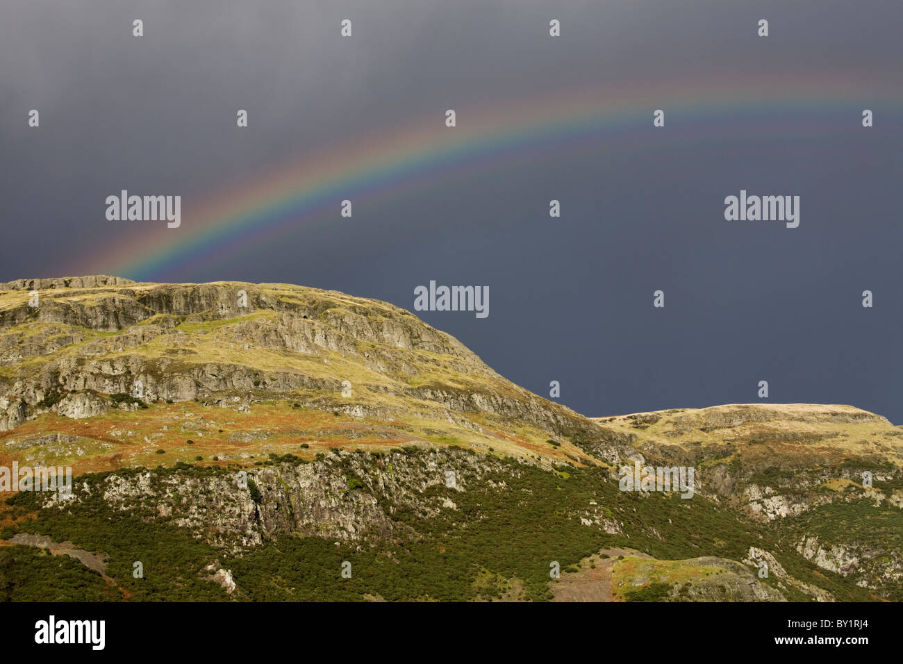 Rainbow over the Ochil Hills, near Stirling, Clackmannanshire, Scotland Stock Photo