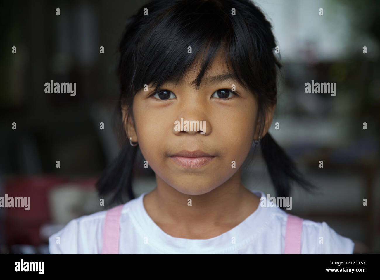 A young Thai Muslim girl looking at camera, Thailand Stock Photo - Alamy