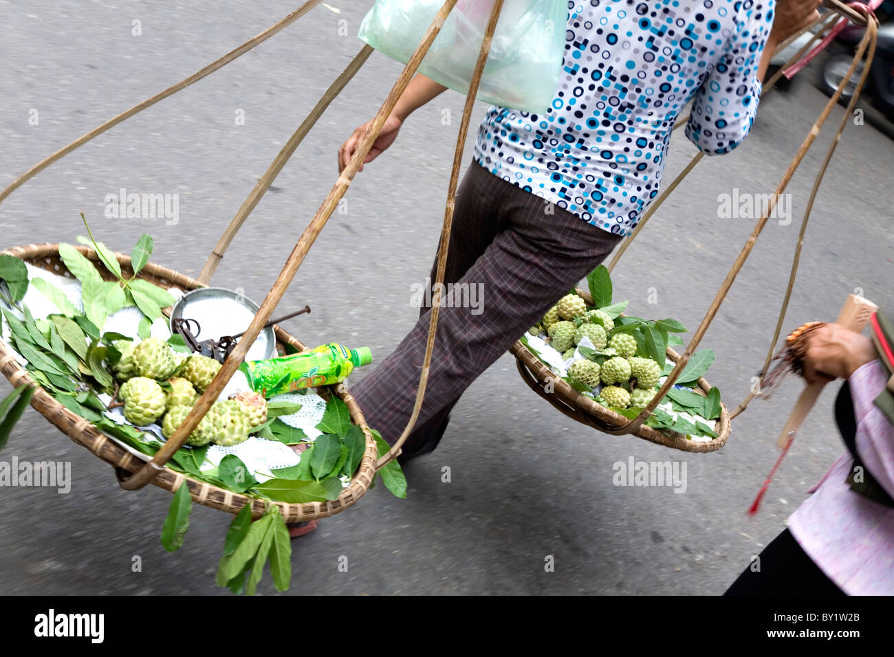 hawker in a street. Hanoi, Vietnam Stock Photo Alamy