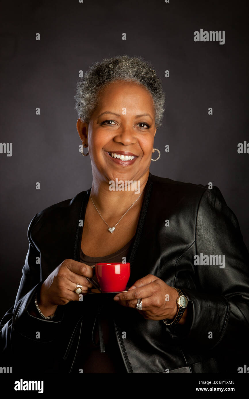 African American woman drinking coffee Stock Photo - Alamy