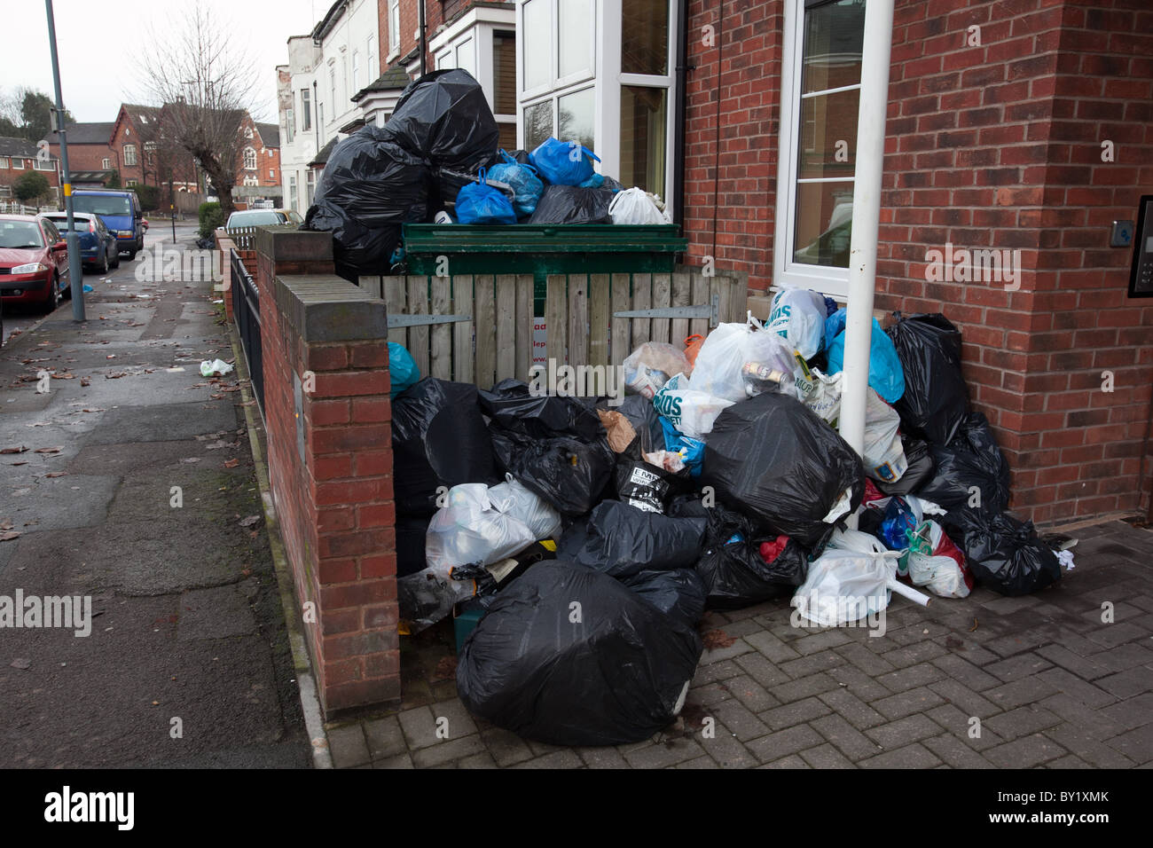 Uncollected rubbish lies in streets around Birmingham caused by bad