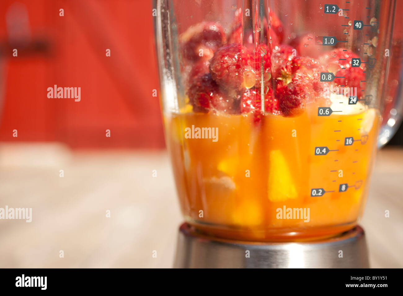 Fruit in a blender Stock Photo Alamy
