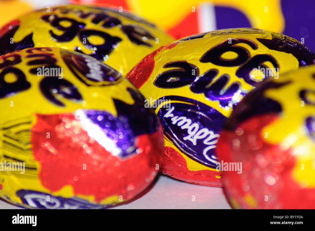 cadbury chocolate creme egg multi pack close up with various eggs in and out of focus Stock Photo