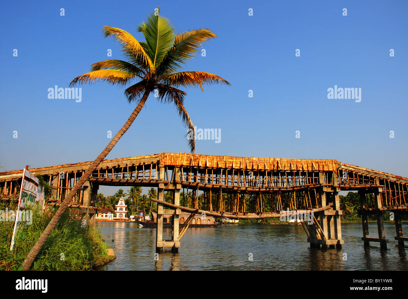 A straw and wood bridge in the Kerala backwaters of India Stock Photo