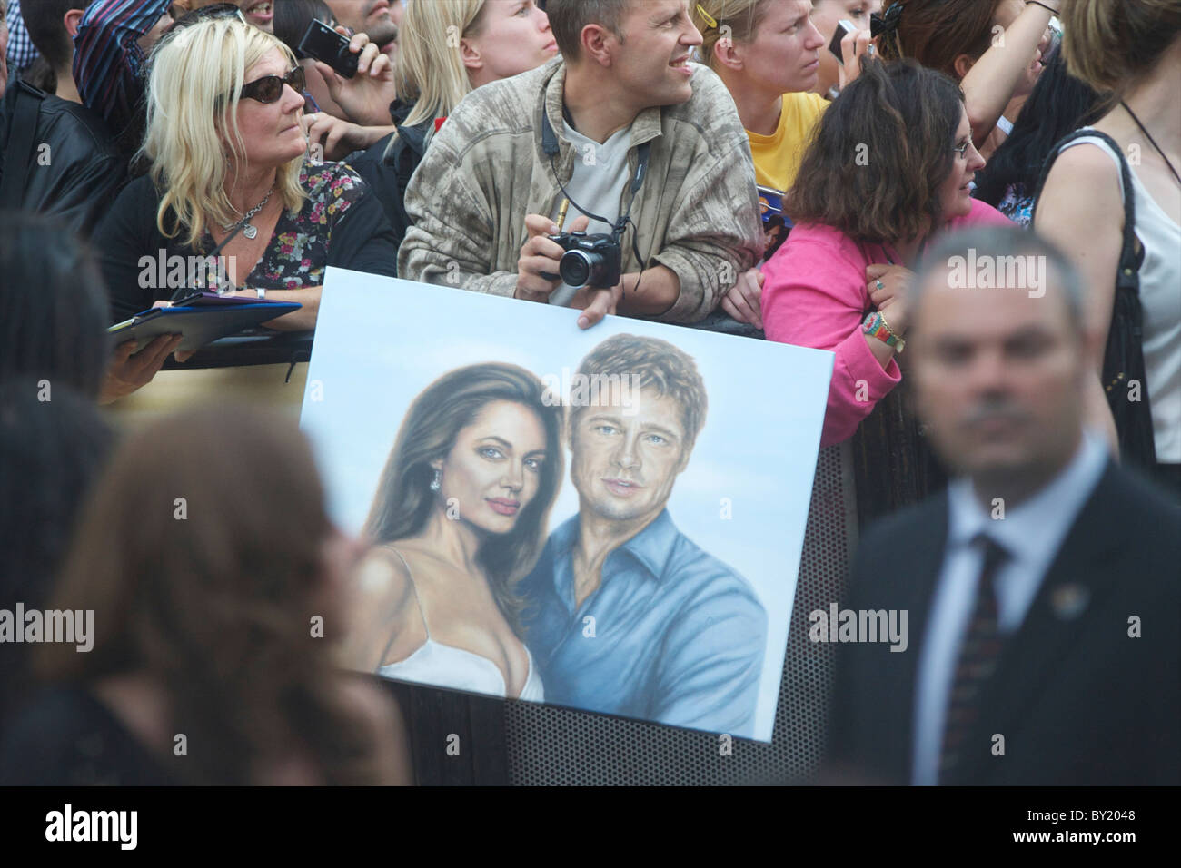 Fans clamor for autographs from Angelina Jolie at the premiere of 'Salt,' on August 16, 2010, at the Empire, Leicester Square Stock Photo