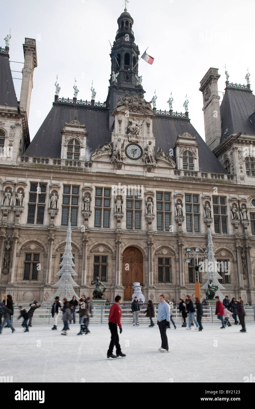 Ice Skating outside Hotel de Ville in Winter in Paris, France Stock