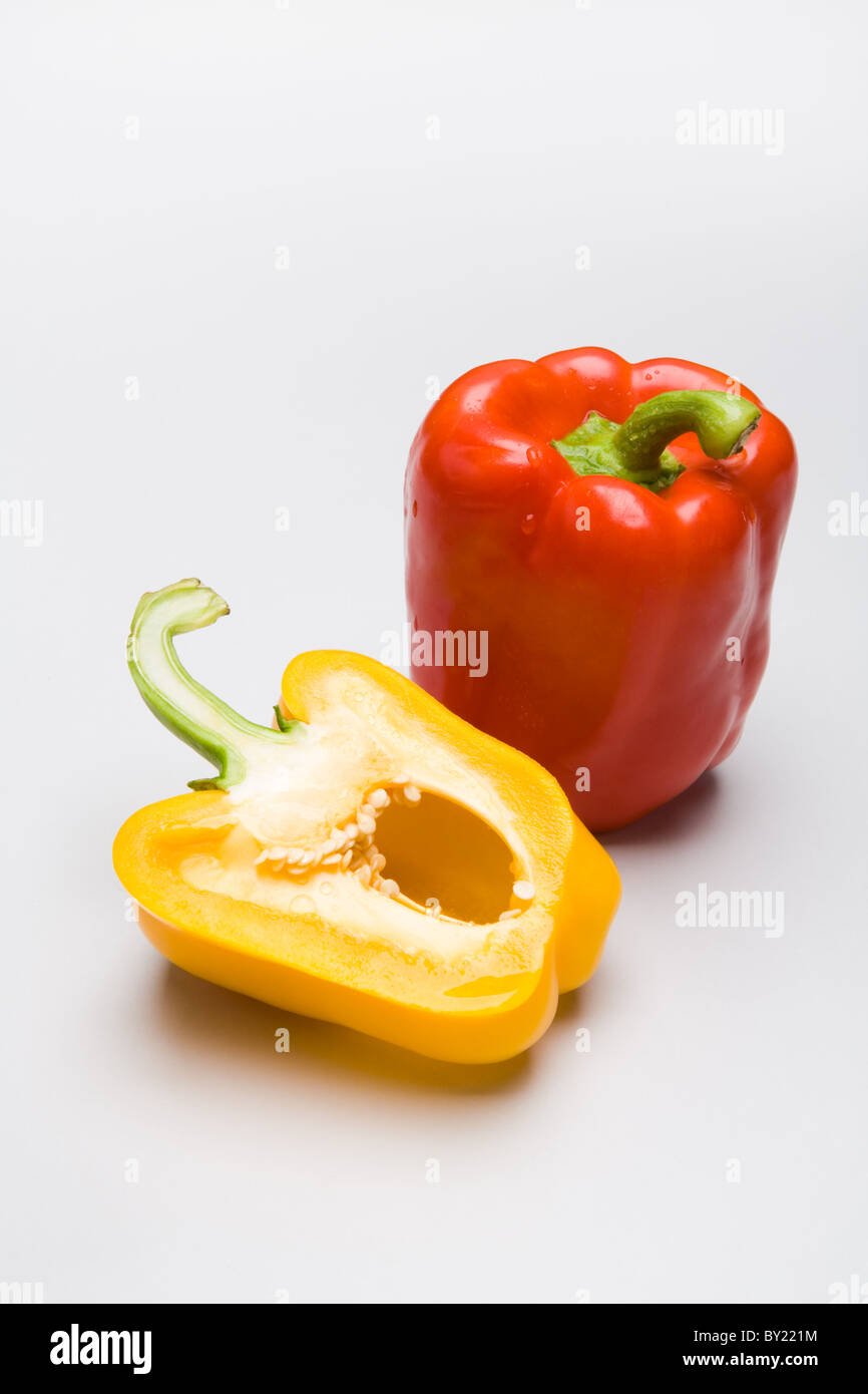 Photo of red and yellow peppers isolated on a white background Stock ...