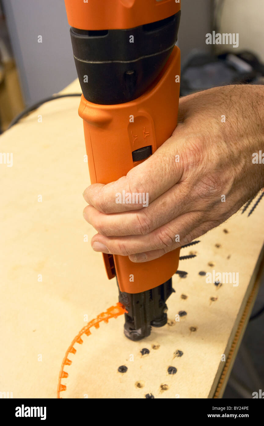 Pneumatic nail gun Stock Photo Alamy