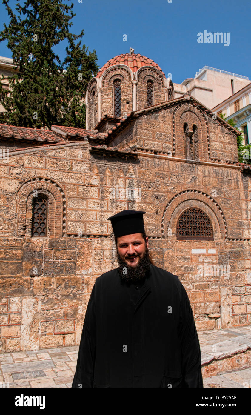 Greek Orthodox Priest in Plaka area of Athens Greece with shopping and