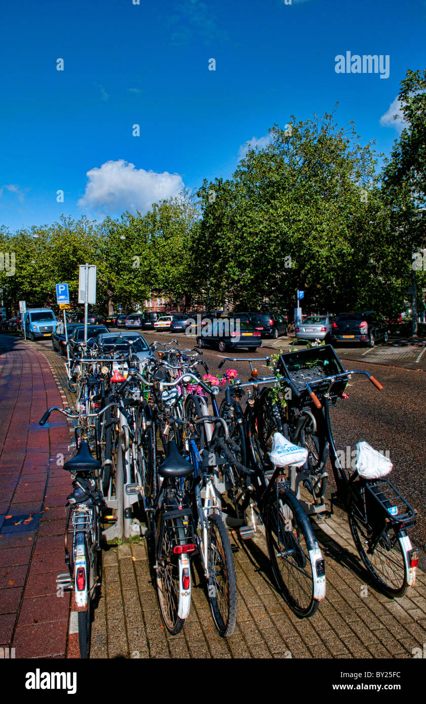 The importance of bicycles in Amsterdam Holland Netherlands in a sunny day Stock Photo