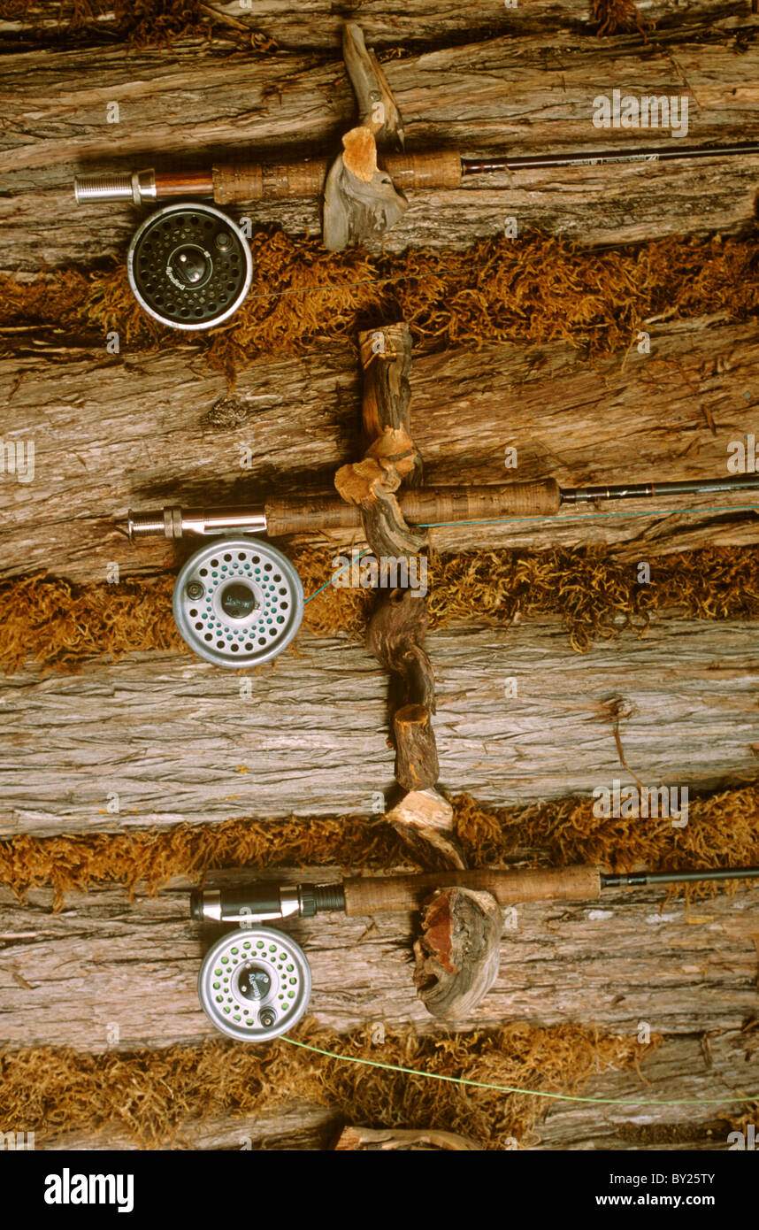 Kenya, Mount Kenya. Fly fishing rods for trout fishing hand on the wall