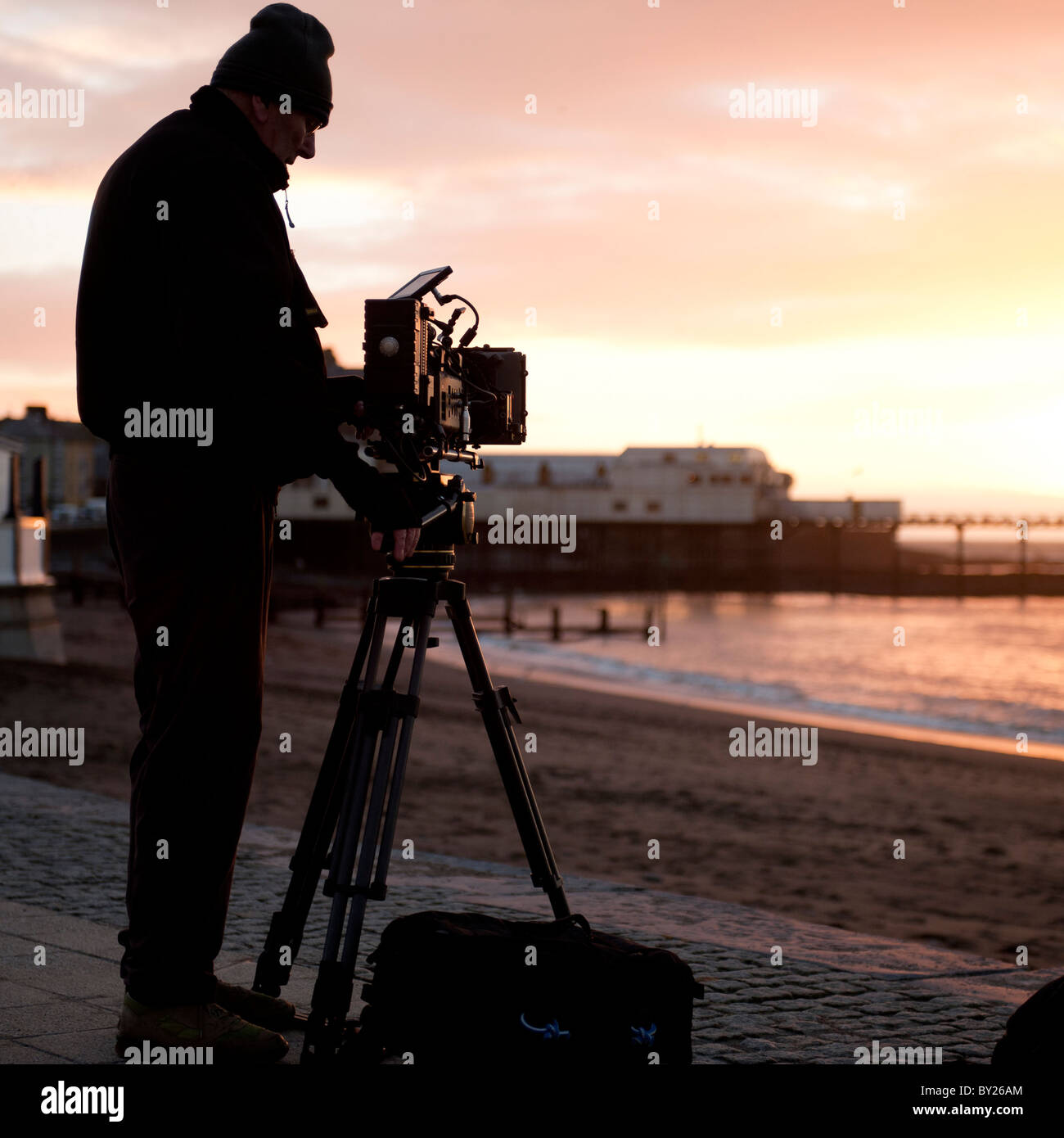 a cameraman using a RED modular digital professional video camera Stock Photo