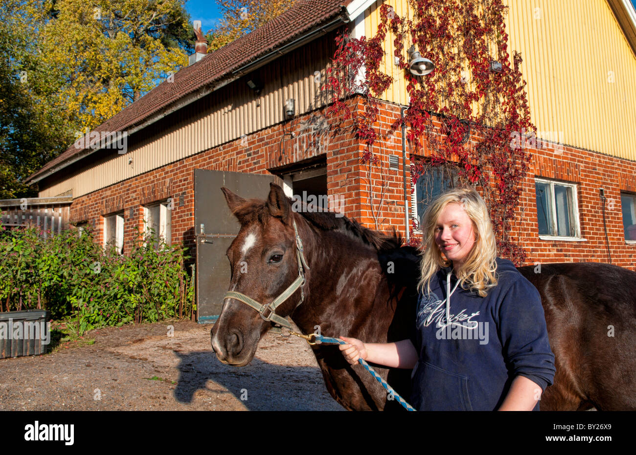 Parainer Pargas Finland horse back riding with teenage girl as hobby in